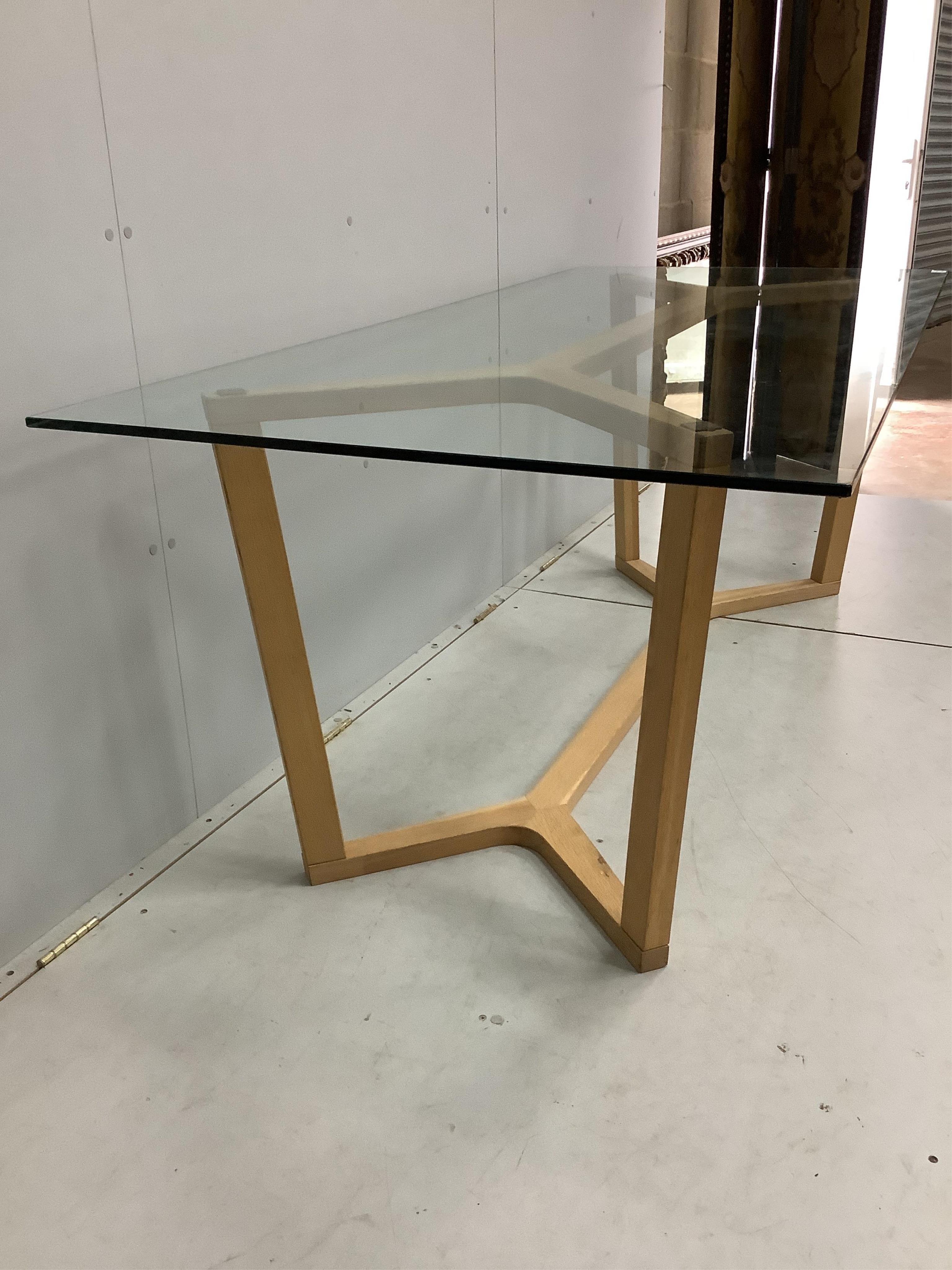 A Contemporary rectangular glass topped shaker style dining table on oak underframe, width 198cm, depth 89cm, height 72cm together with a matching bench seat